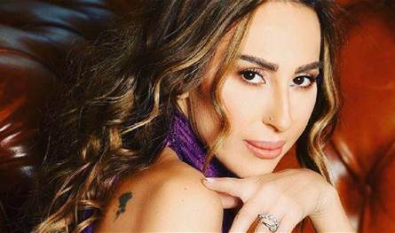 ورد-الخال-بإطلالة-شتوية-أنيقة-من-إسطنبول